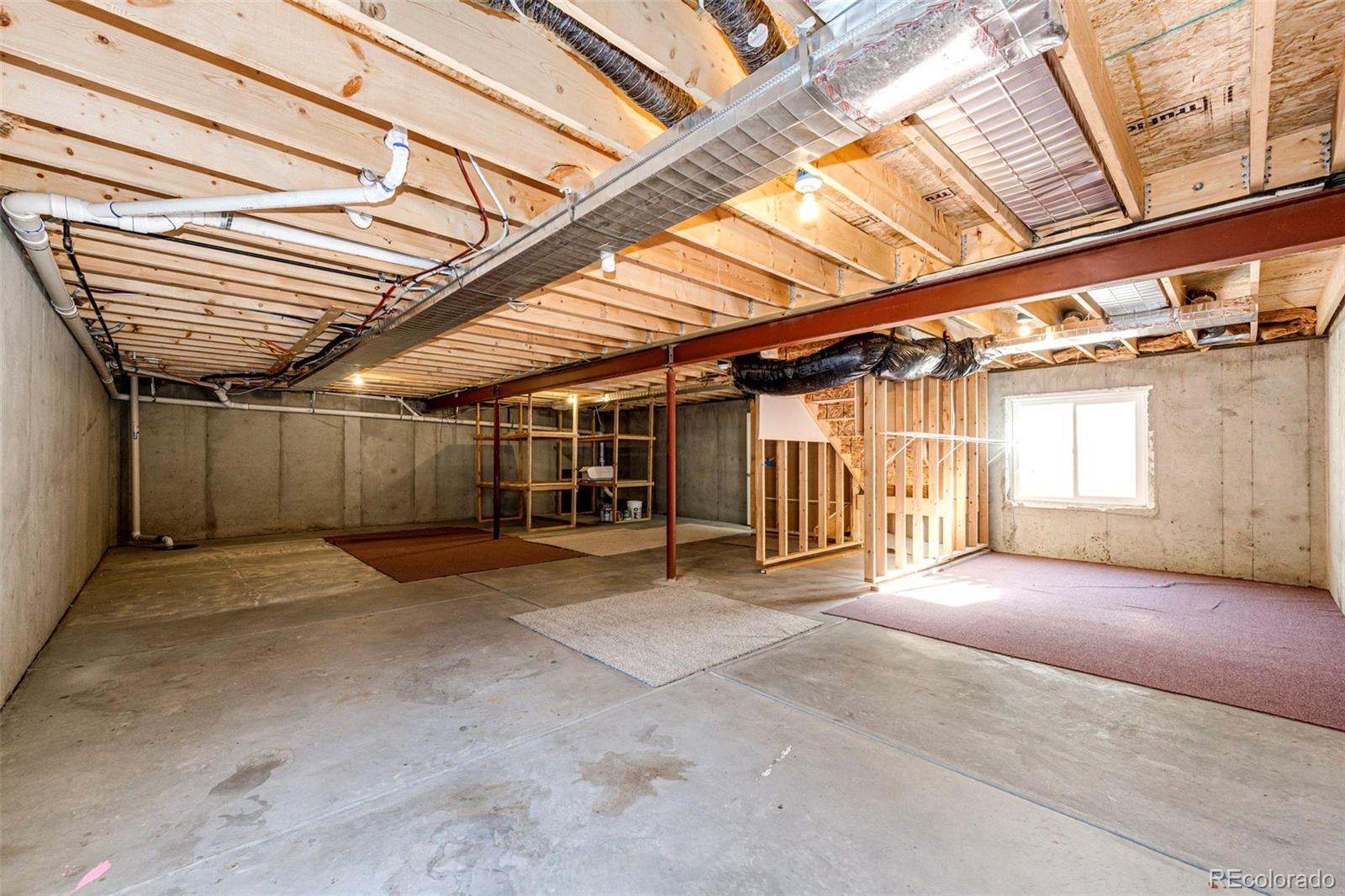 574 4th Street Bennett, CO 80102 - Photo 21 of 24 a view of a garage