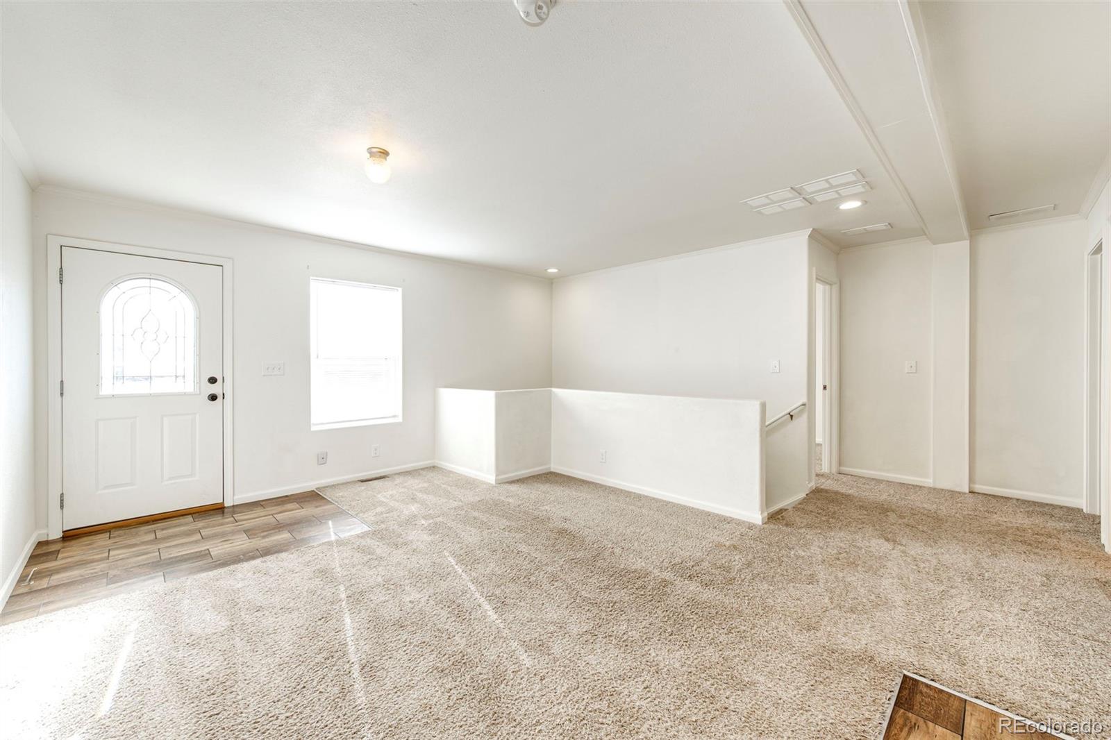 574 4th Street Bennett, CO 80102 - Photo 10 of 24 a view of an empty room