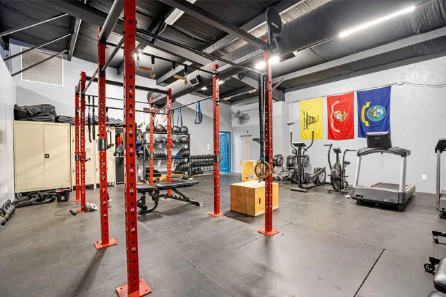 a view of a room with gym equipment