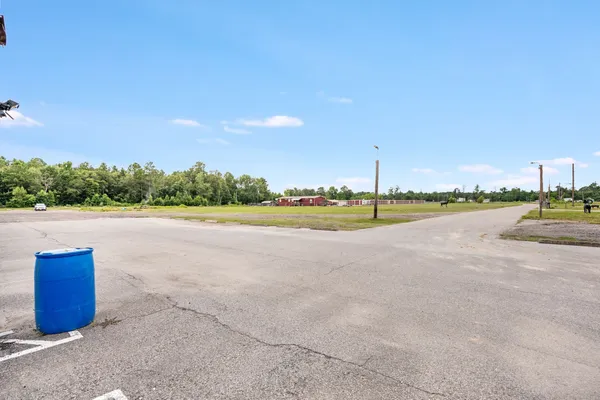 a view of a house with a big yard