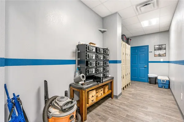 a kitchen with stainless steel appliances granite countertop a stove and a refrigerator