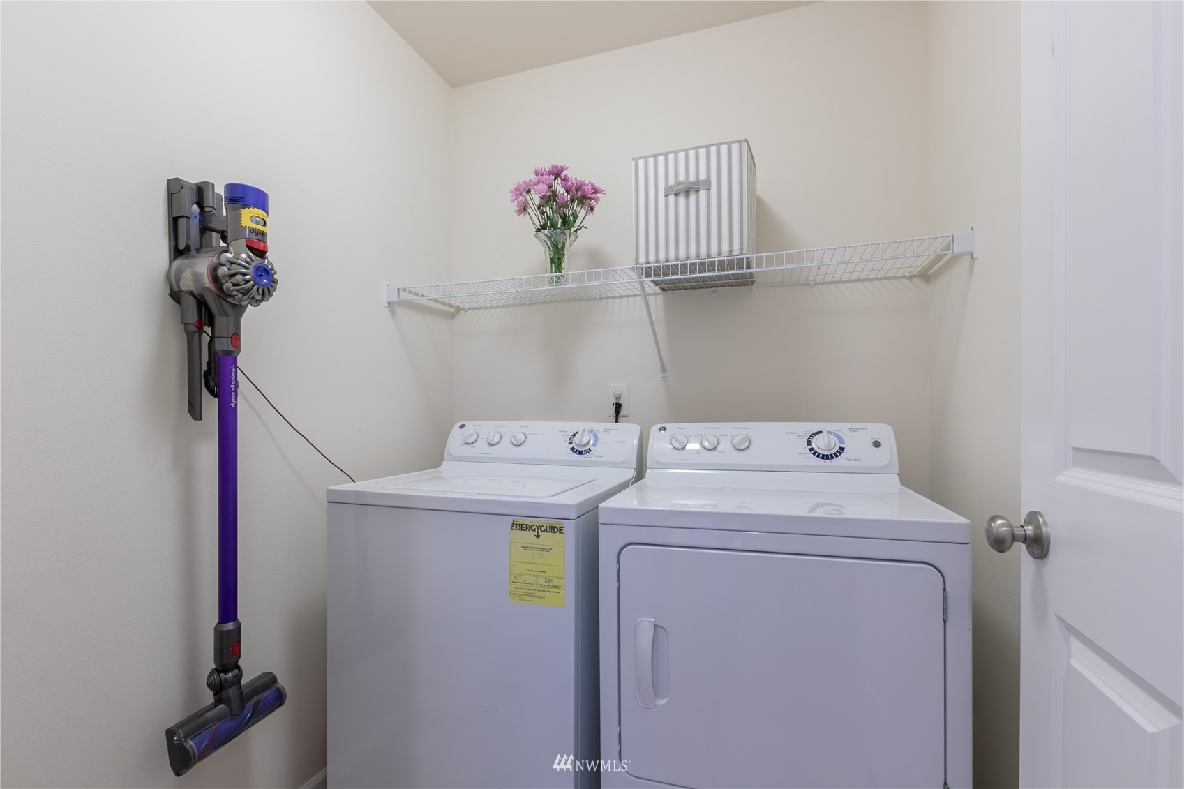 3667 London Loop Northeast Lacey, WA 98516 - Photo 11 of 26 a utility room with dryer and washer