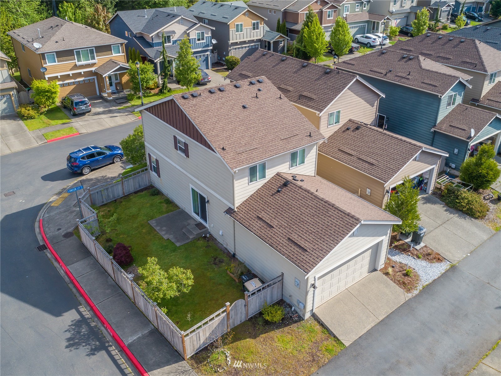 3667 London Loop Northeast Lacey, WA 98516 - Photo 23 of 26 an aerial view of a house