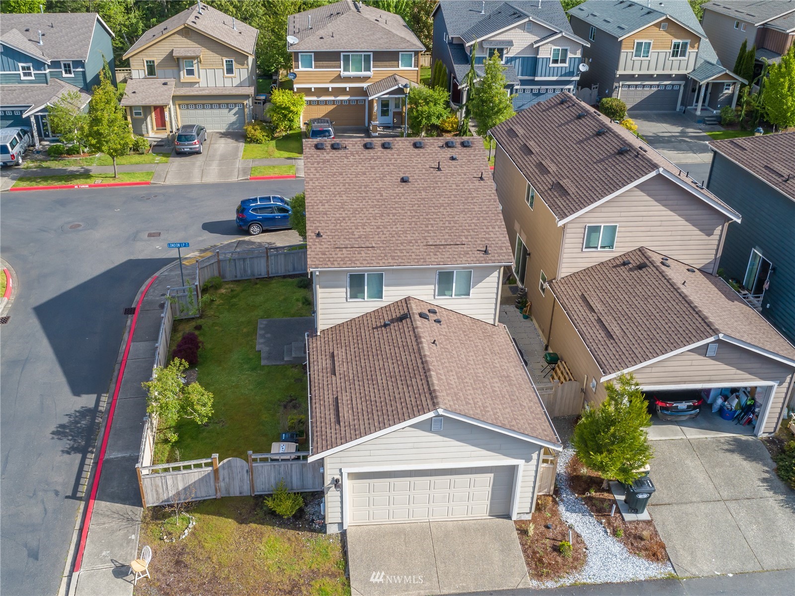 3667 London Loop Northeast Lacey, WA 98516 - Photo 24 of 26 an aerial view of residential houses with outdoor space