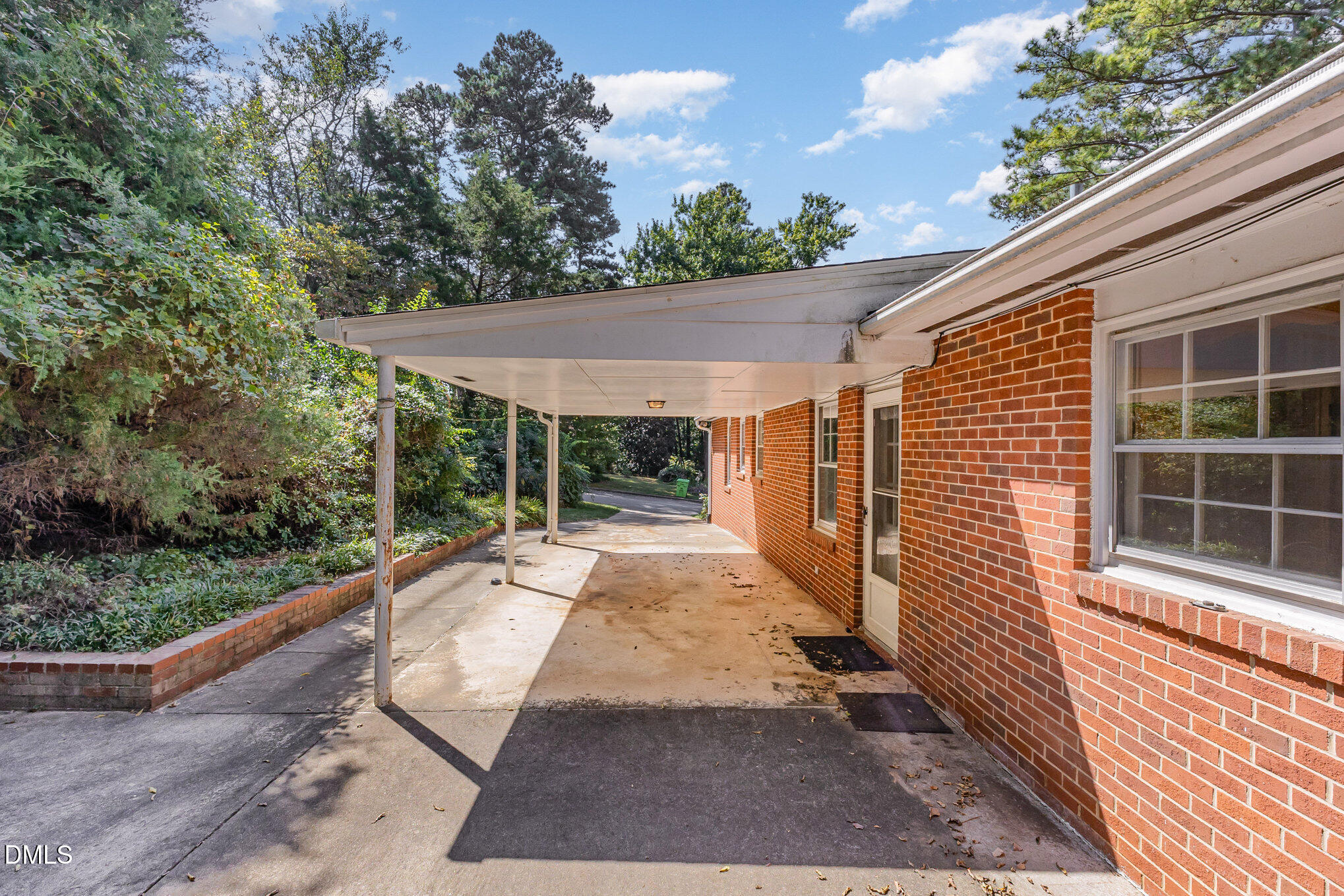 913 Merwin Road Raleigh, NC 27606 - Photo 8 of 28 Driveway and carport