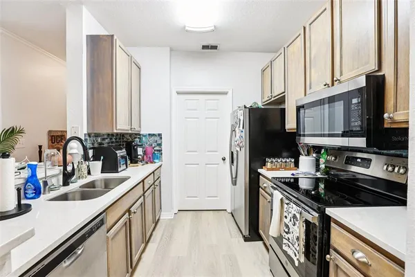 $250,000 | 10125 Courtney Palms Boulevard, Unit 201, Tampa, FL 33619