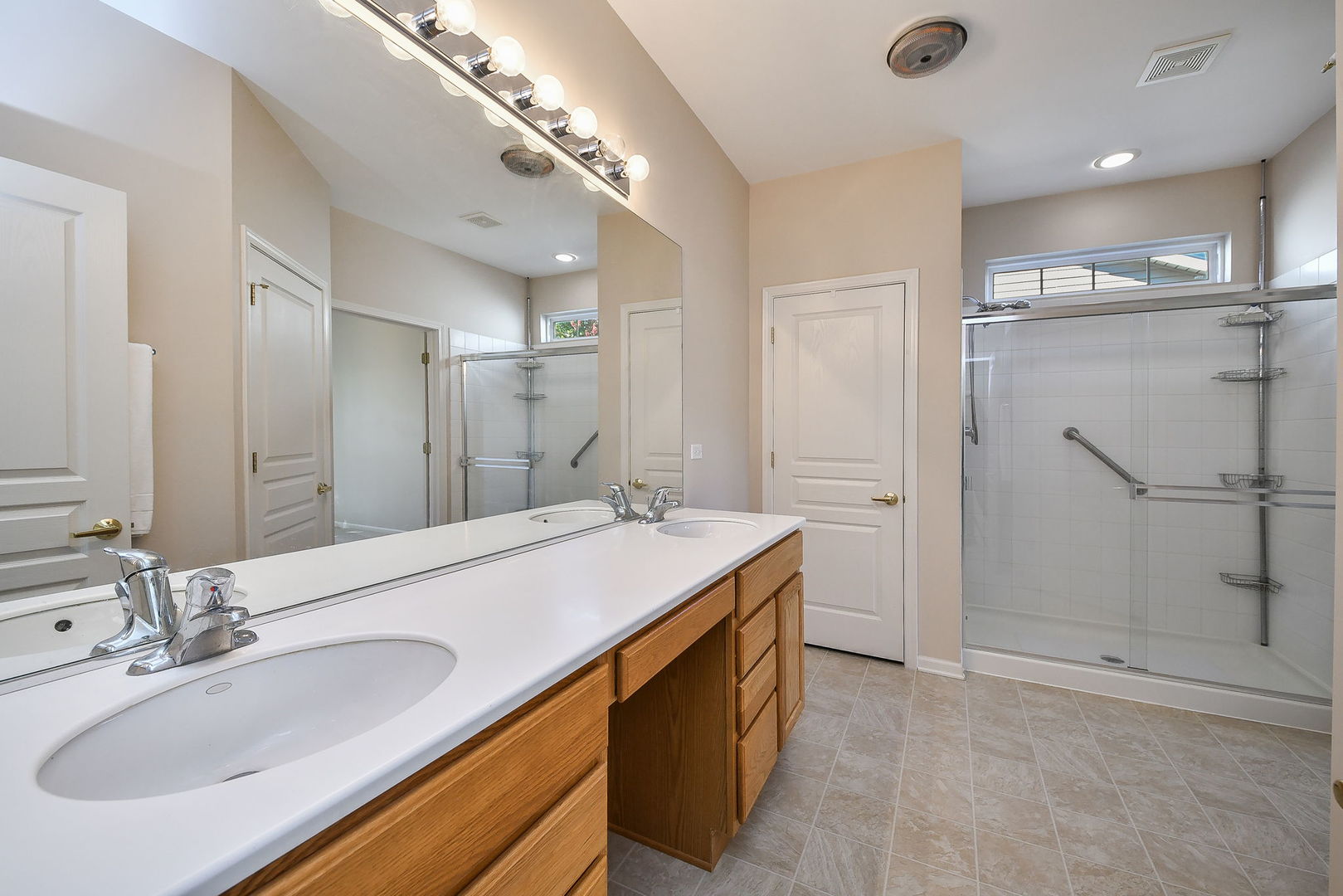 2525 Rolling Ridge Elgin, IL 60124 - Photo 11 of 26 a bathroom with a sink double vanity and a mirror