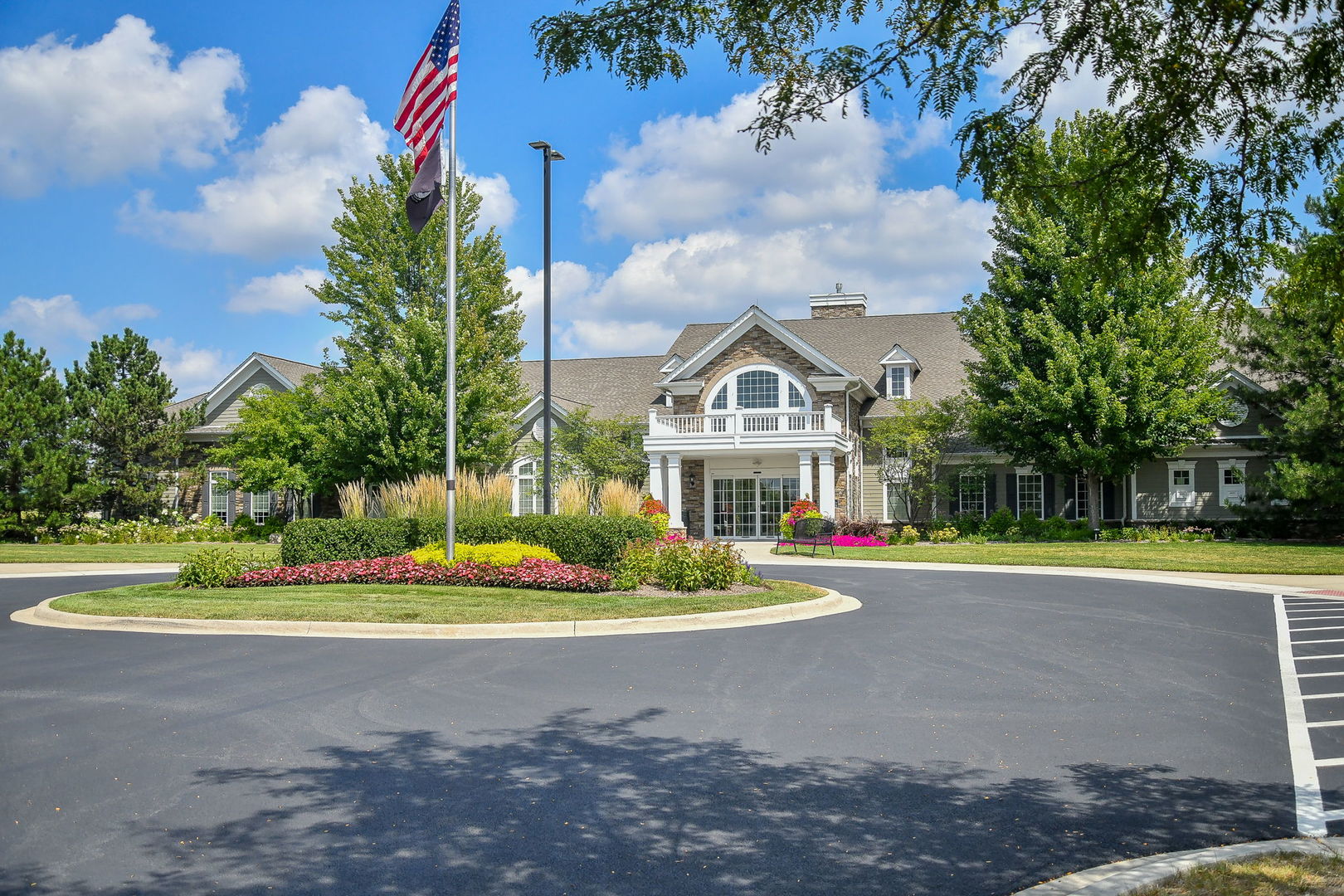 2525 Rolling Ridge Elgin, IL 60124 - Photo 21 of 26 a front view of a house with a yard and trees