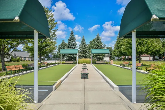 a view of swimming pool with a patio