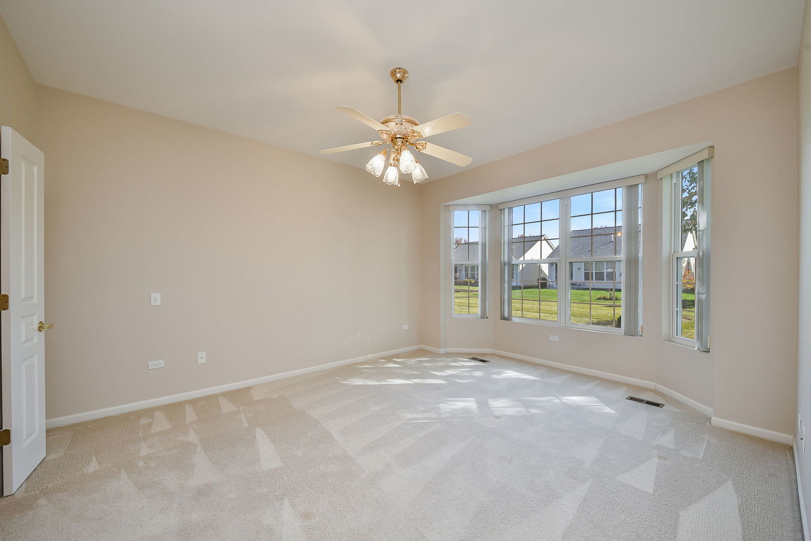 2525 Rolling Ridge Elgin, IL 60124 - Photo 10 of 26 a view of an empty room with a window