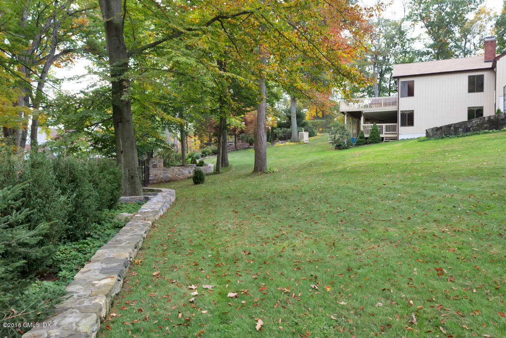 12 Ledge Brook Road Stamford, CT 06903 - Photo 29 of 34 a view of a house with a back yard