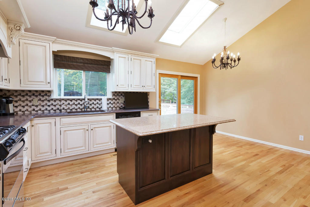 12 Ledge Brook Road Stamford, CT 06903 - Photo 6 of 34 a kitchen with a sink cabinets and window