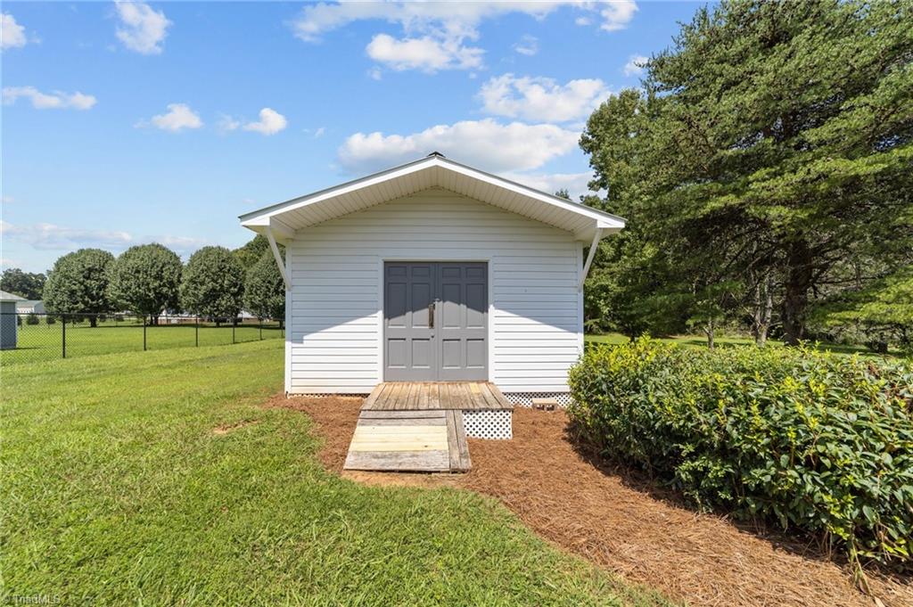 495 Ben Lee Road Thomasville, NC 27360 - Photo 30 of 35 Storage shed