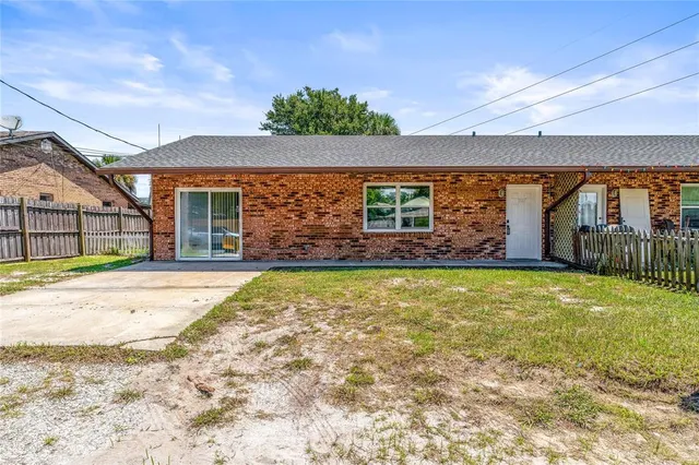 front view of a house with a big yard