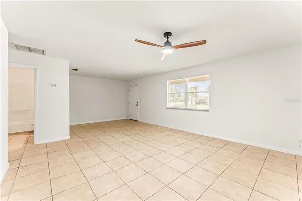 a view of an empty room and window