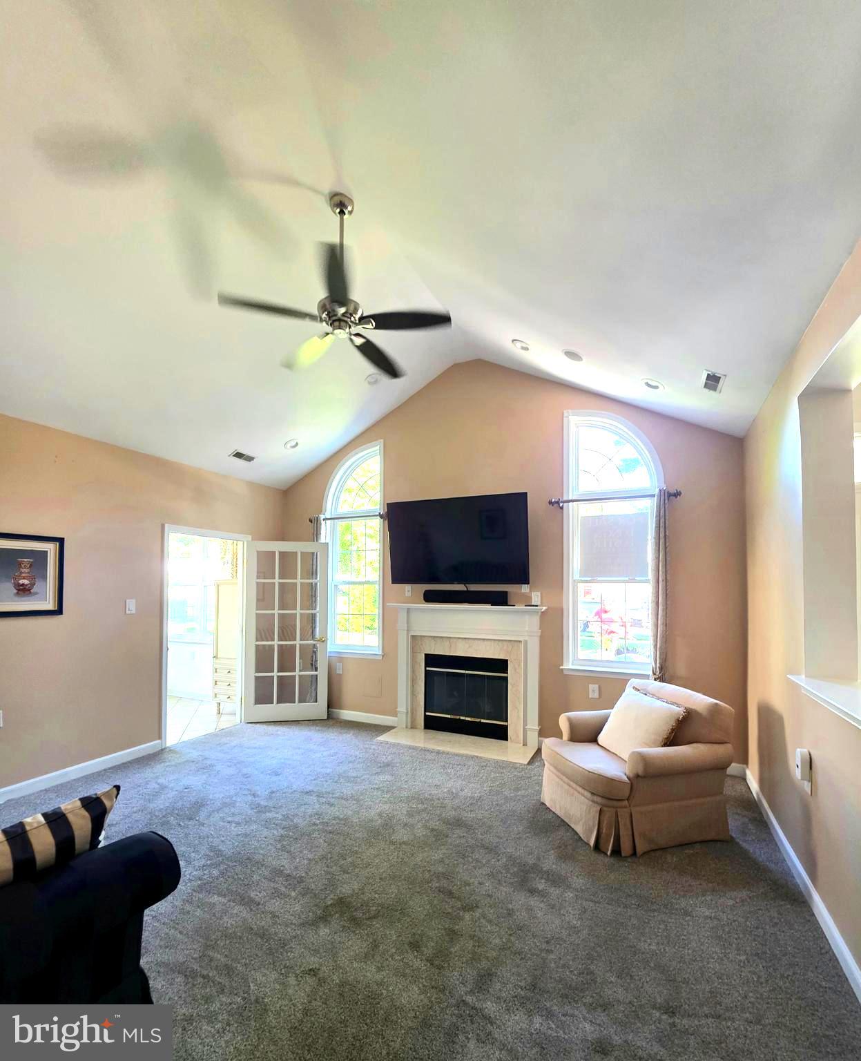 105 Hulnick Road, Unit 438 Coatesville, PA 19320 - Photo 2 of 5 Beautiful living room with marble gas fireplace