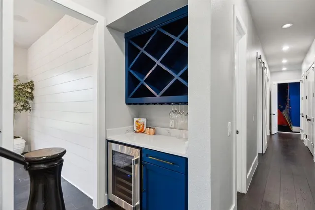 a bathroom with a sink a mirror and shower