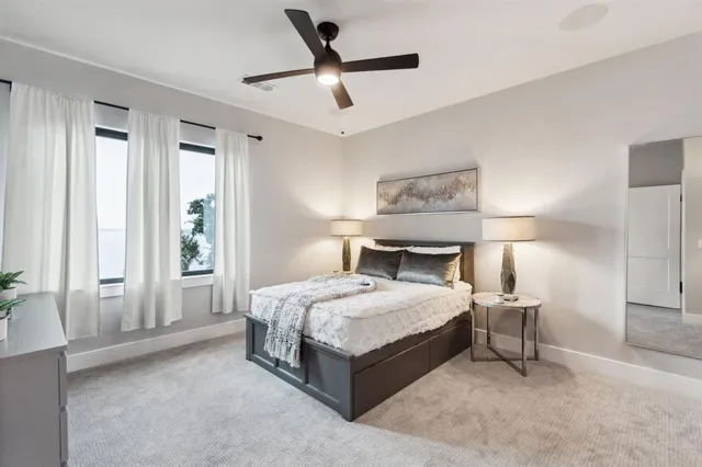 a outdoor living space with furniture and a flat screen tv