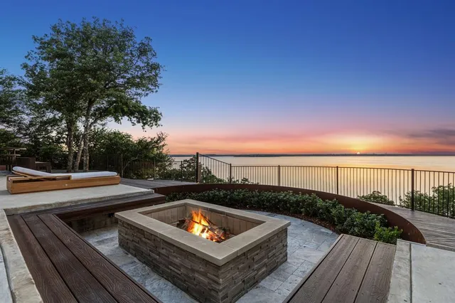 a aerial view of a house with swimming pool and porch