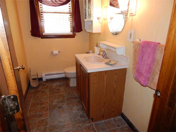 37 Howland Road Lakeville, MA 02347 - Photo 13 of 14 a bathroom with sink a toilet and a mirror