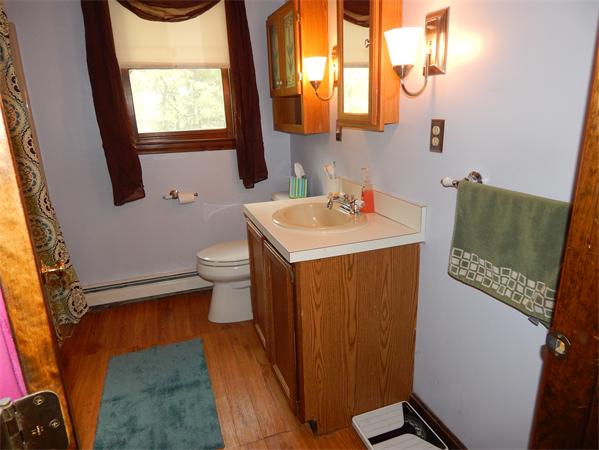 37 Howland Road Lakeville, MA 02347 - Photo 14 of 14 a bathroom with a sink a toilet and a mirror