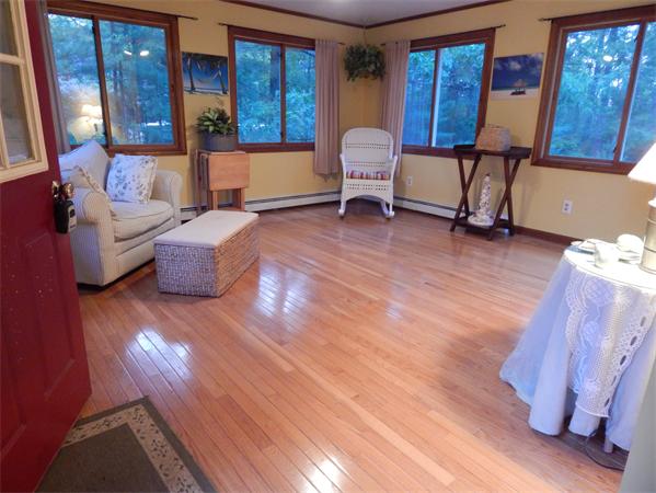 37 Howland Road Lakeville, MA 02347 - Photo 2 of 14 a living room with furniture and wooden floor