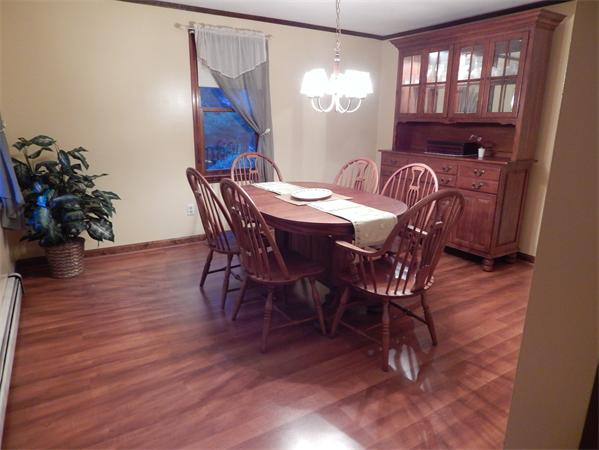 37 Howland Road Lakeville, MA 02347 - Photo 6 of 14 a view of a dining room with furniture window and wooden floor