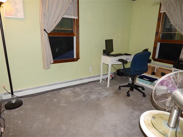 37 Howland Road Lakeville, MA 02347 - Photo 10 of 14 a view of a workspace with furniture and a window