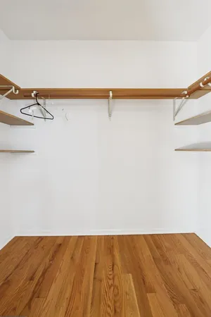a view of empty room with a ceiling fan