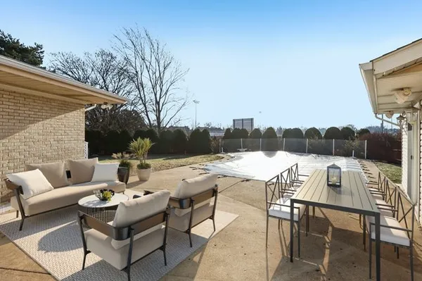 a view of a lake with a big yard