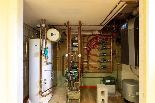 a living room with furniture gym equipment and view of living room