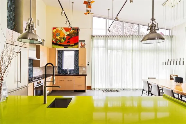 a swimming pool with outdoor seating