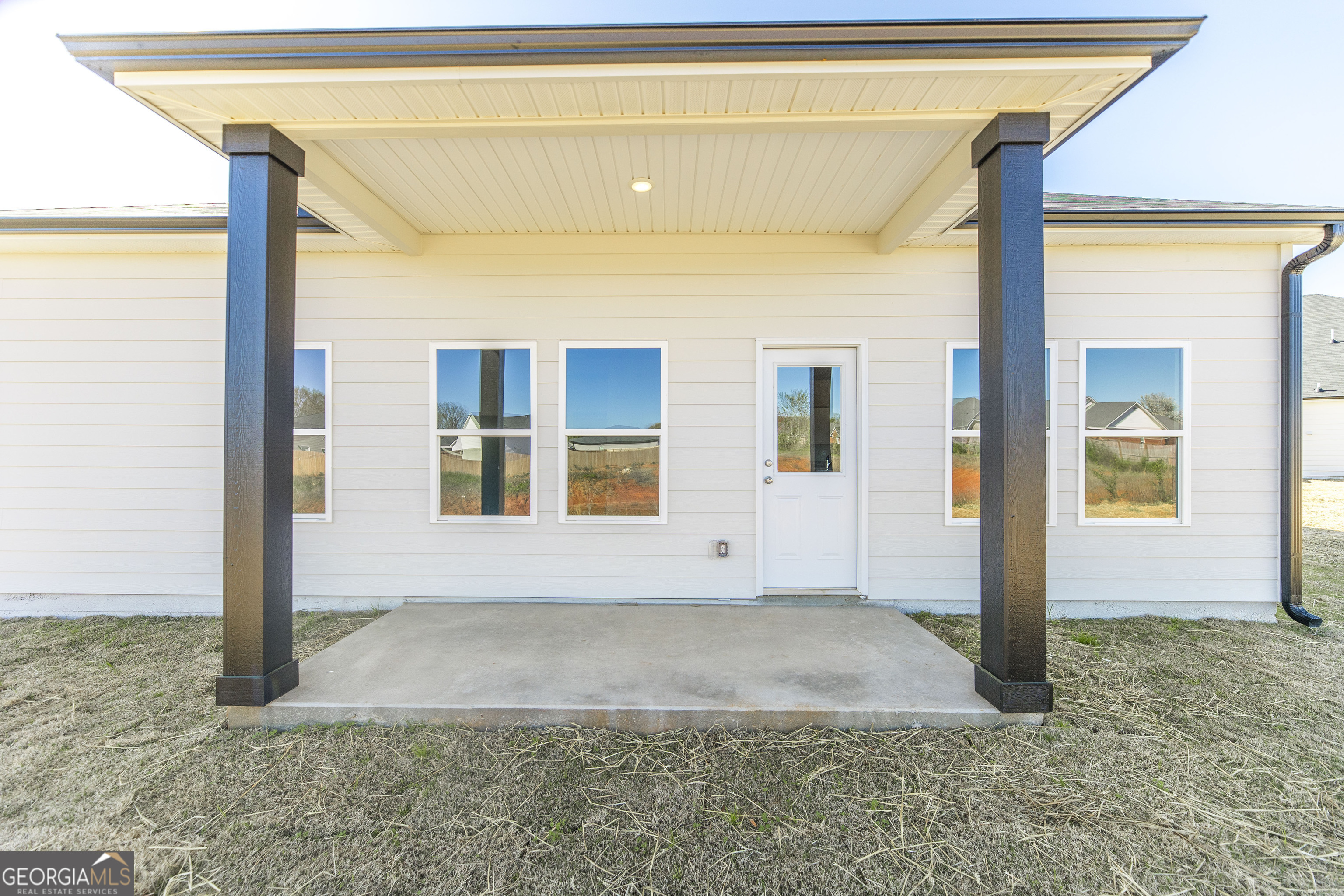 102 Monroe Court Byron, GA 31008 - Photo 26 of 30 a view of backyard with window