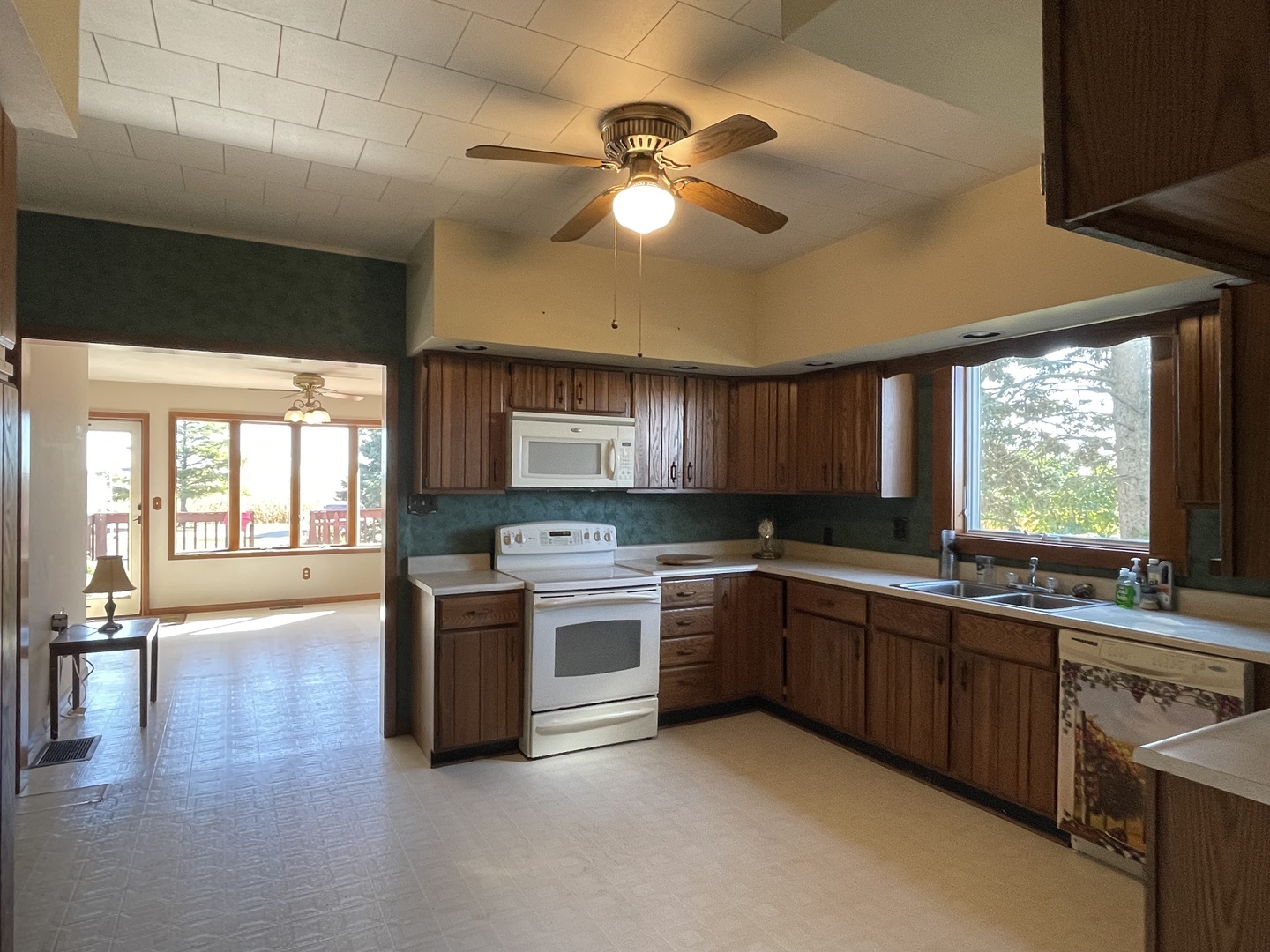 16580 West 5000S Road Buckingham, IL 60917 - Photo 11 of 35 a kitchen with stainless steel appliances granite countertop a stove and a sink