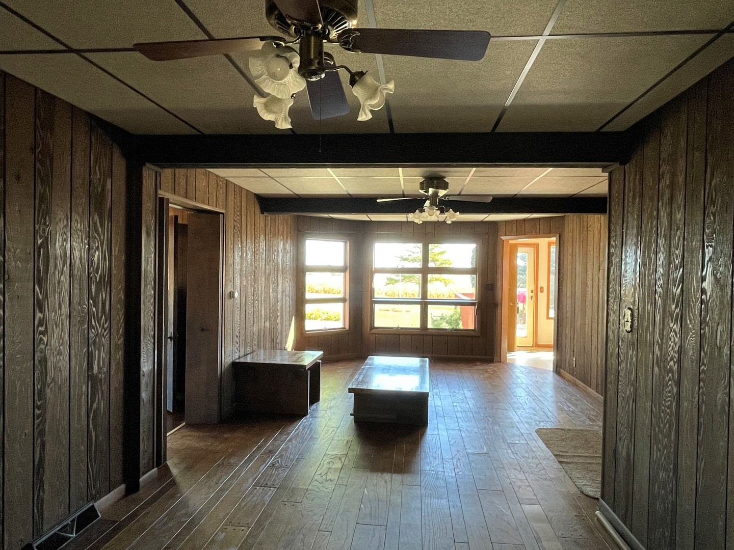 16580 West 5000S Road Buckingham, IL 60917 - Photo 15 of 35 a view of a livingroom with a couch wooden floor and a window