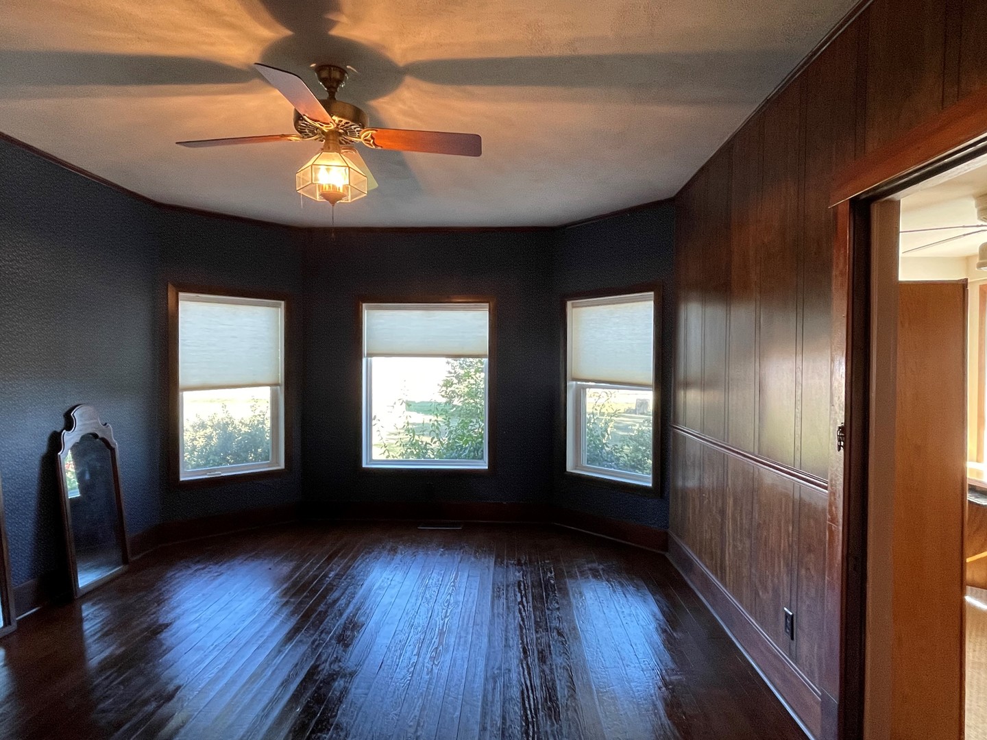 16580 West 5000S Road Buckingham, IL 60917 - Photo 17 of 35 a view of an empty room with window and wooden floor