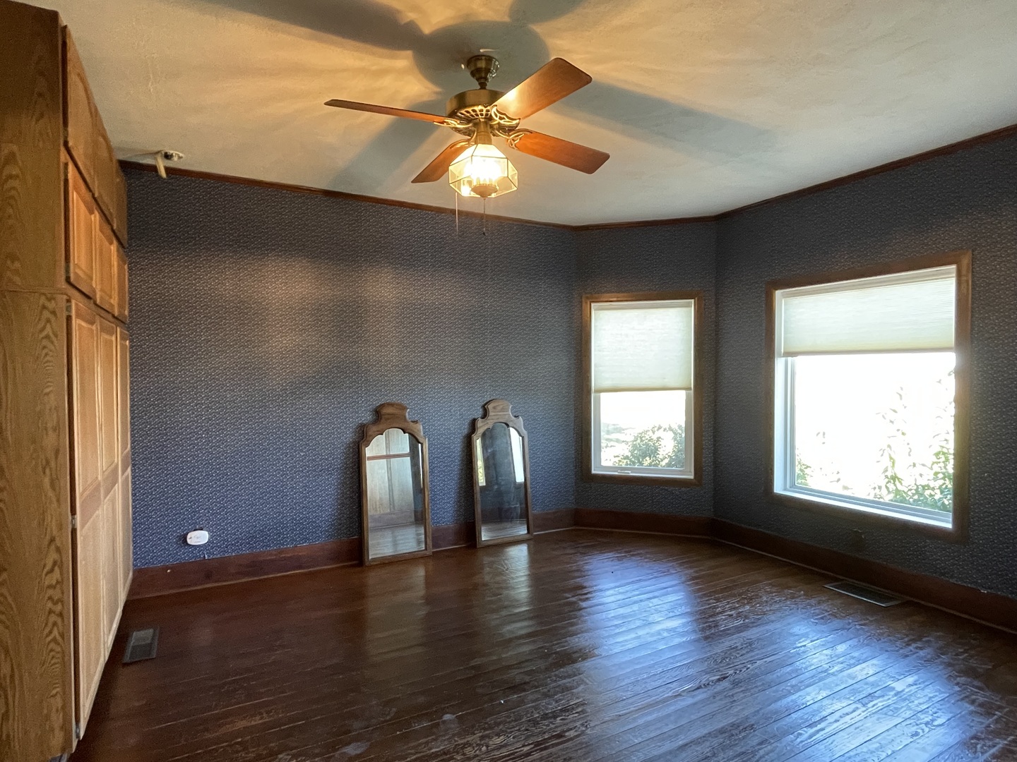 16580 West 5000S Road Buckingham, IL 60917 - Photo 18 of 35 a view of empty room with wooden floor and fan