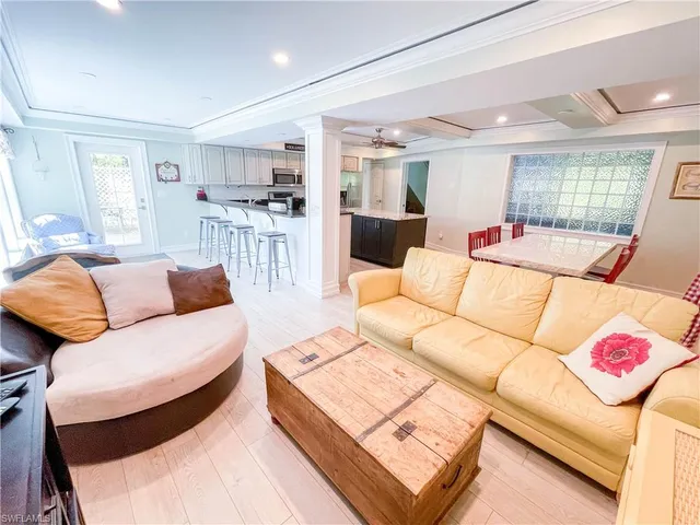 a living room with furniture and a table