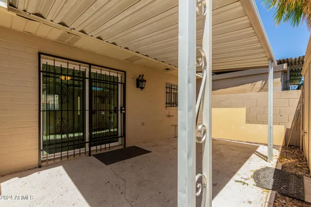 a view of backyard with garage