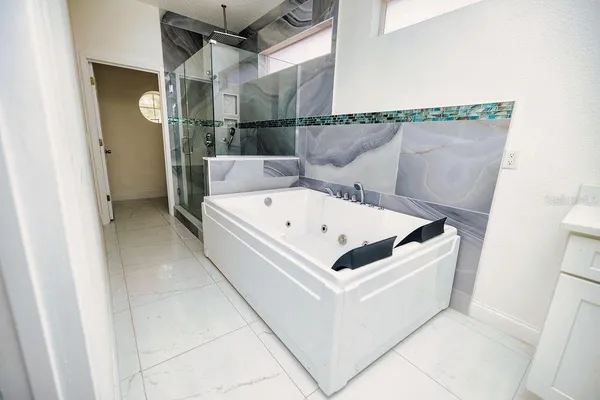 a view of a porch with furniture and floor