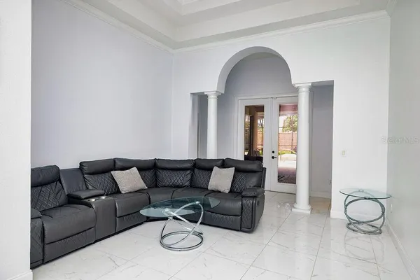 a view of a dining room with furniture window and outside view