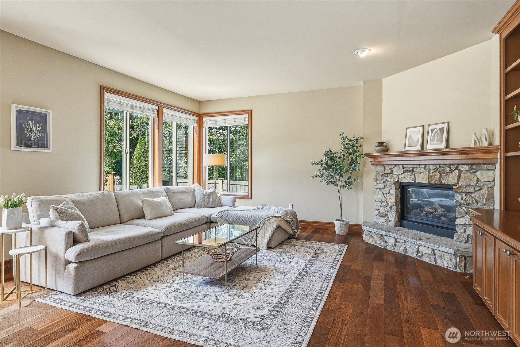 3932 221st Place Southeast Bothell, WA 98021 - Photo 12 of 36 a living room with furniture and a fireplace