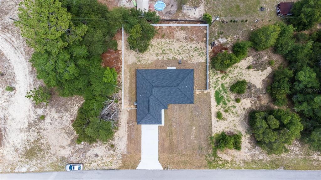 20109 Southwest 84th Street Dunnellon, FL 34431 - Photo 2 of 10 an aerial view of a house with outdoor space