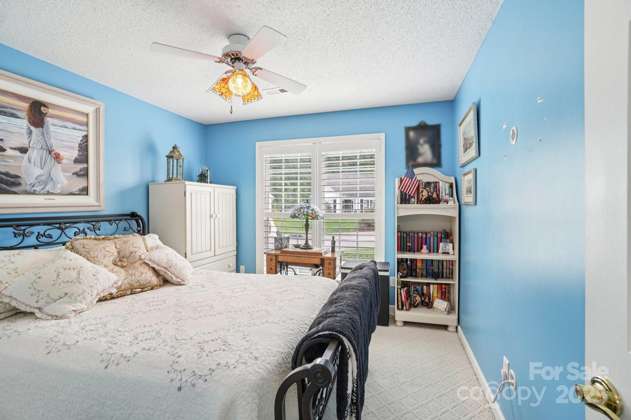133 Stonehollow Road Fletcher, NC 28732 - Photo 22 of 29 a bedroom with a bed furniture and a window