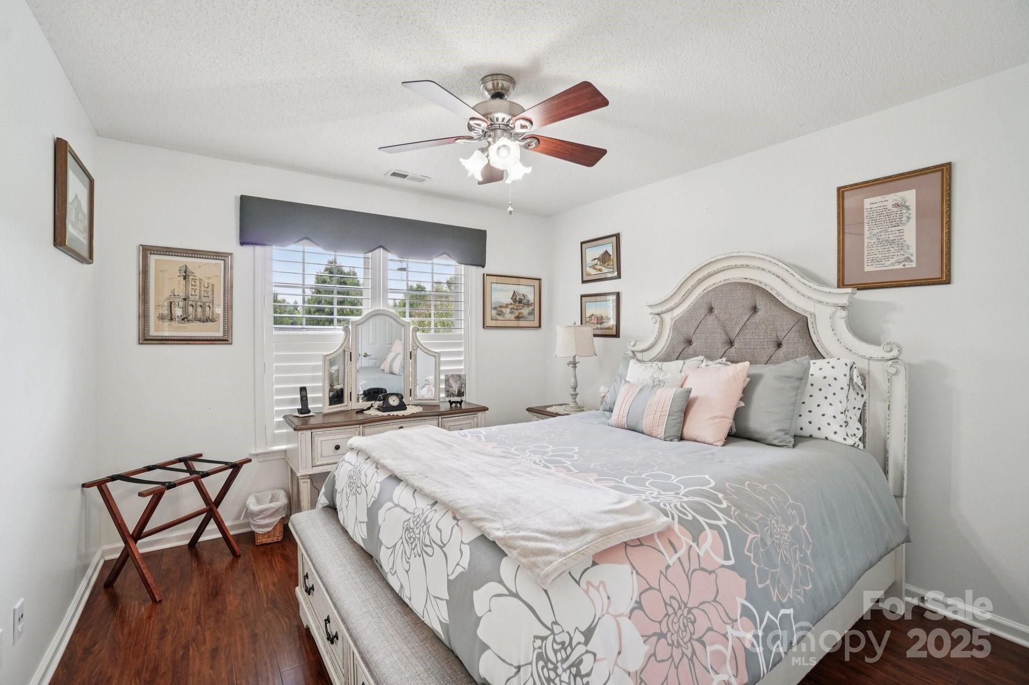 133 Stonehollow Road Fletcher, NC 28732 - Photo 24 of 29 a bedroom with a bed and a table