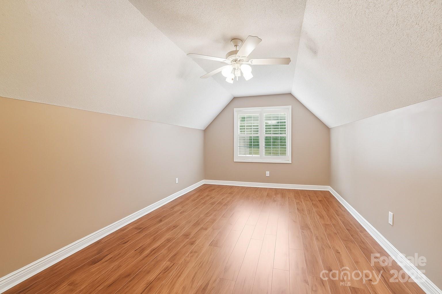 133 Stonehollow Road Fletcher, NC 28732 - Photo 25 of 29 wooden floor in an empty room with a window