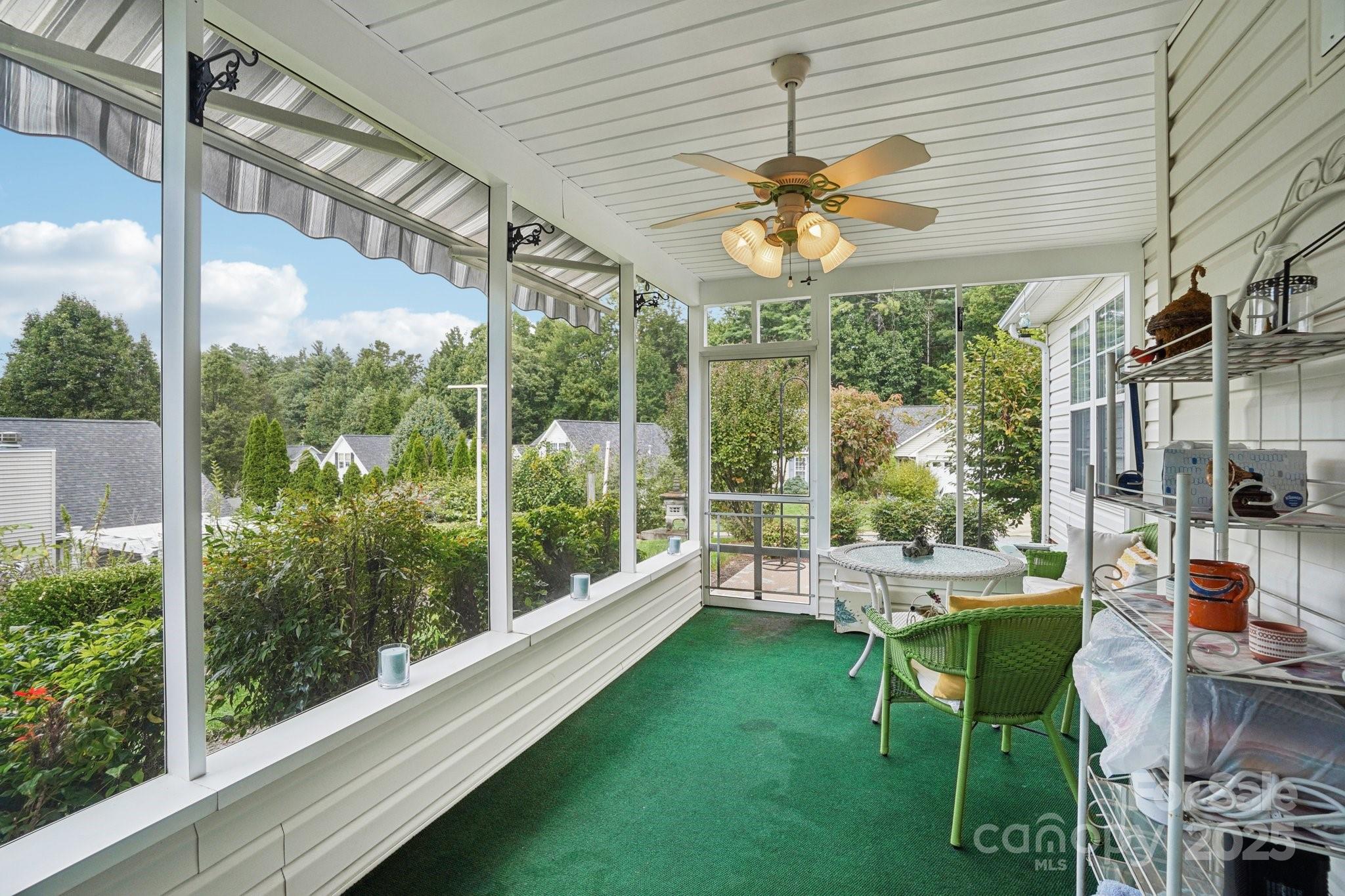 133 Stonehollow Road Fletcher, NC 28732 - Photo 26 of 29 a dining room with furniture and a large window