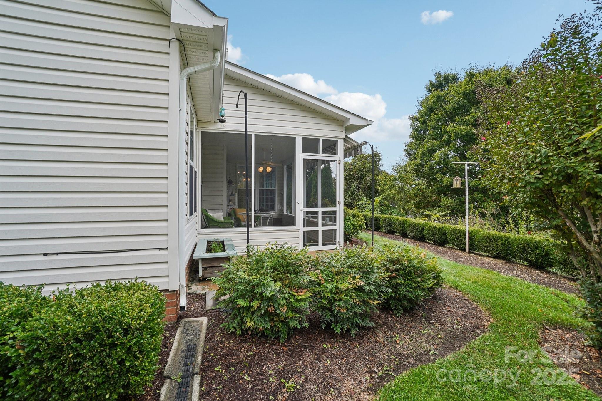 133 Stonehollow Road Fletcher, NC 28732 - Photo 28 of 29 a view of a house with backyard and garden