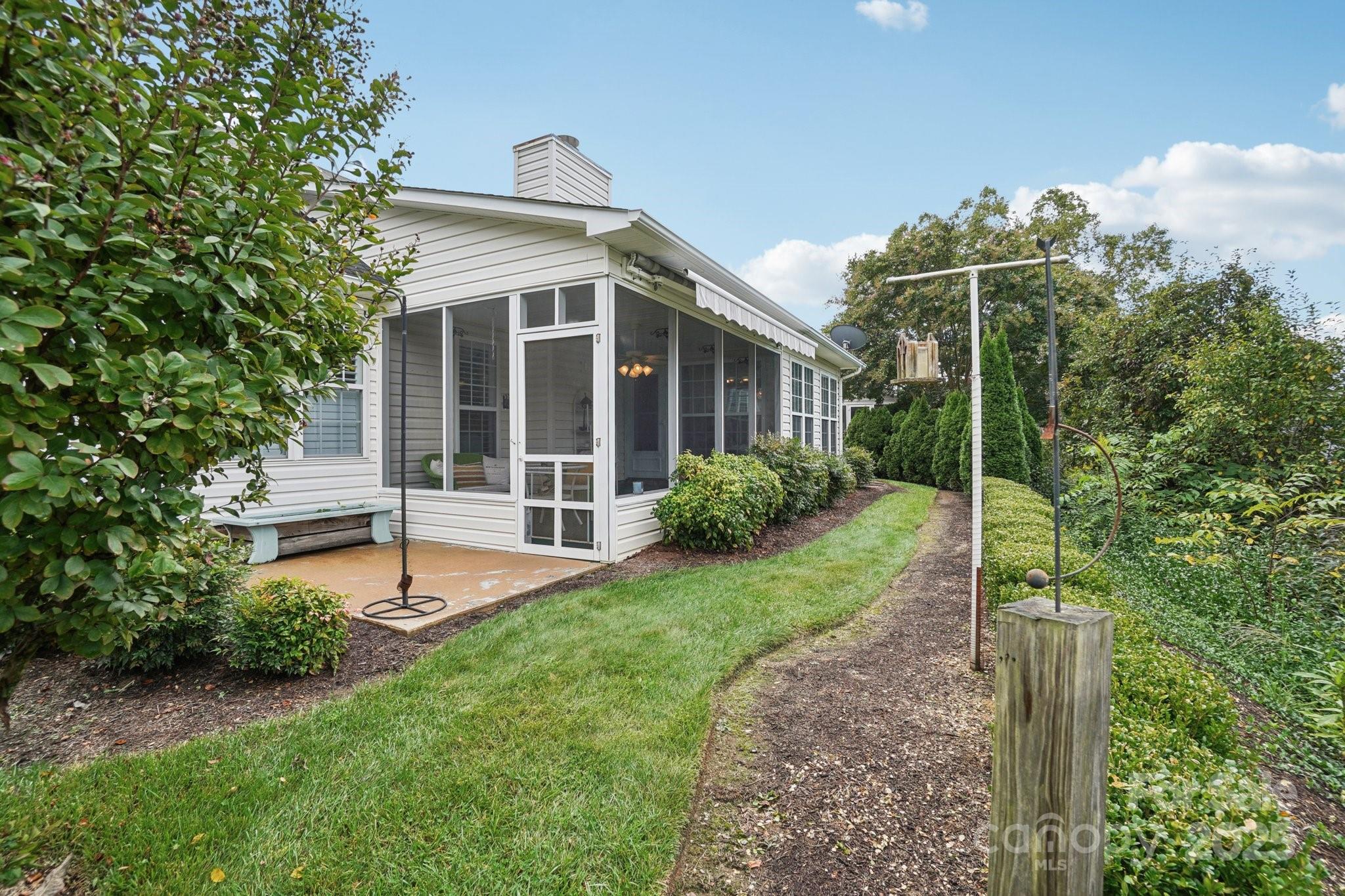 133 Stonehollow Road Fletcher, NC 28732 - Photo 29 of 29 a view of a house with backyard and garden