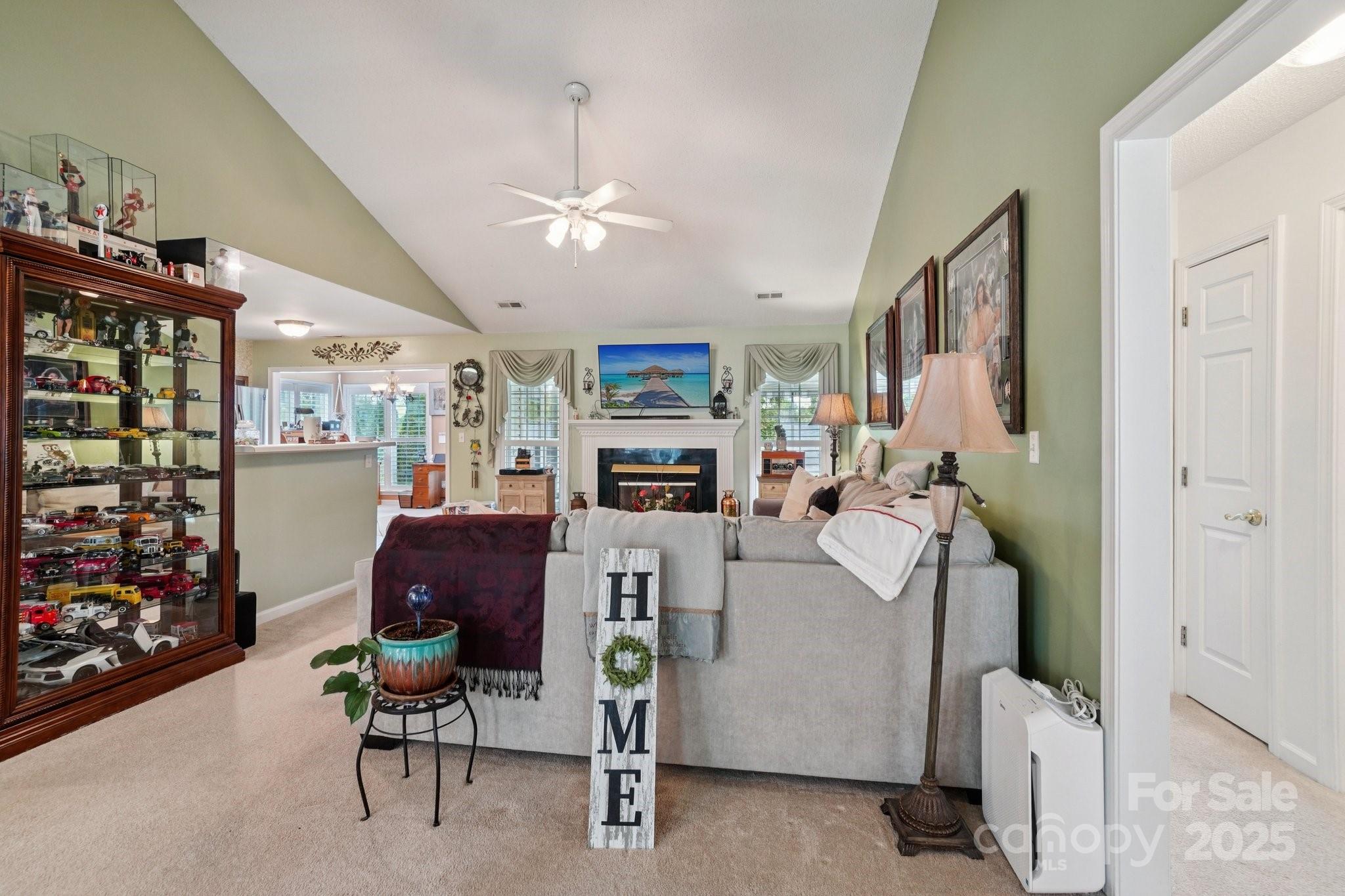 133 Stonehollow Road Fletcher, NC 28732 - Photo 4 of 29 a living room with furniture and a flat screen tv